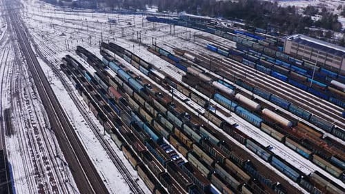 Aerial View of Snow-Covered Freight Train Yard