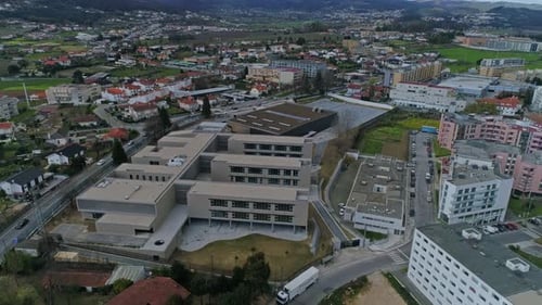 Aerial View of a Suburban School and Town