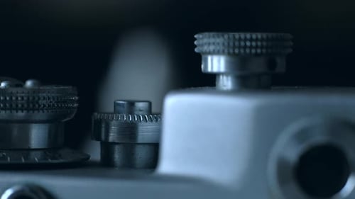 Turning Knob on Vintage Camera Close Up