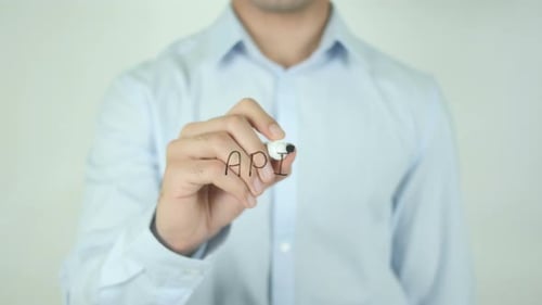 Man Writes API on Clear Surface