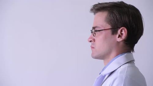 Profile View of Young Handsome Man Doctor