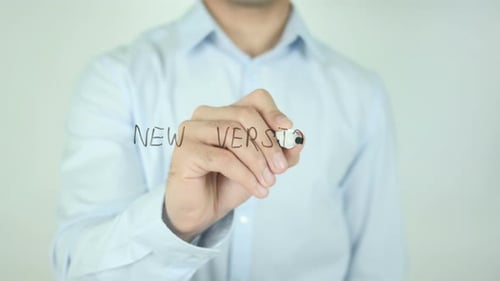 Man Writes New Version on Clear Surface