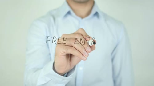 Hand Writes 'Free Entry' on Transparent Surface