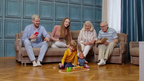Multi-Generational Family Relaxing Together at Home
