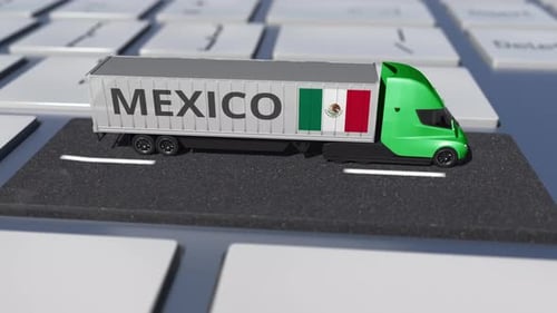 Flag of Mexico on Moving Truck and Computer Keyboard