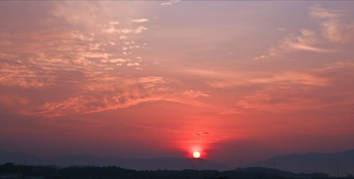 Vibrant Sunrise over Mountains in a Nature Setting
