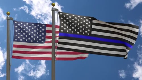 American and Thin Blue Line Flags Waving Together against Sky