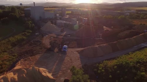 Forestry and logging operations taking place in the highlands of Scotland using large industrial mac