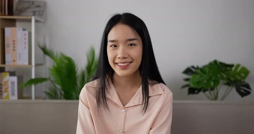 Smiling Young Woman At Home