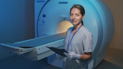 Portrait of Female Radiologist with MRI Machine