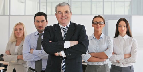 Confident Business Team Posing in Modern Office