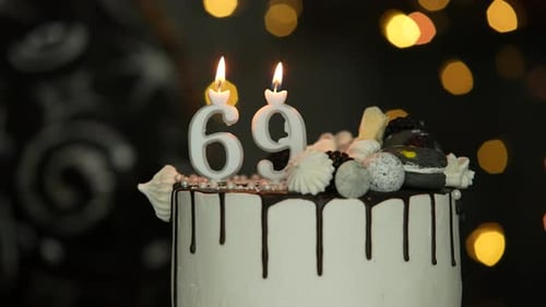 Delicious Birthday Cake with Burning Number Candles