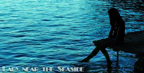 Woman Sitting by Tropical Blue Ocean on Pier