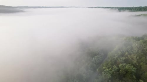 Aerial Drone View of Beautiful Valley Between Mountains During Misty Sunrise Morning