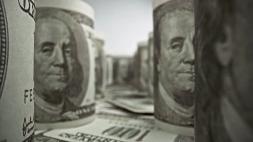 American one hundred dollar paper banknote in close up macro view dolly shot.