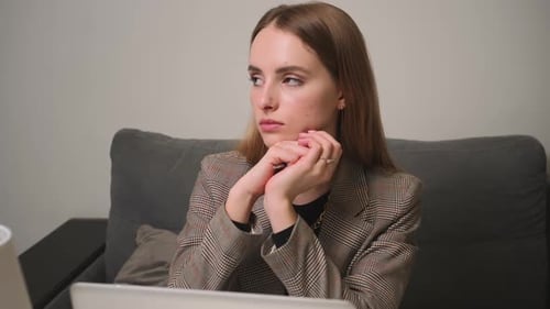 Close Up of Upset Woman Thinking About Mistakes in Work