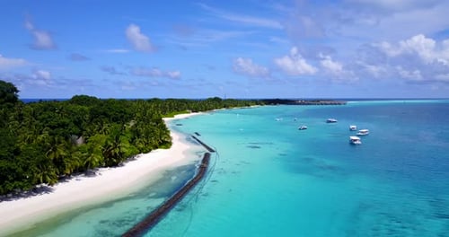 Daytime above abstract shot of a paradise sunny white sand beach and aqua turquoise water background