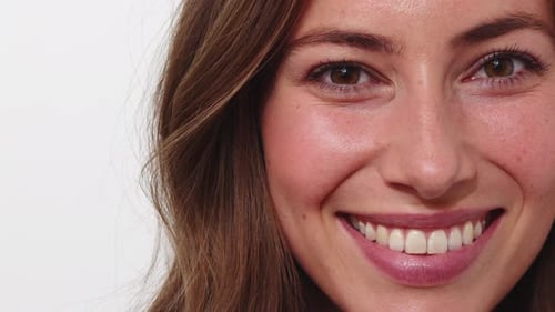 Close-up of Smiling Woman's Face and Teeth