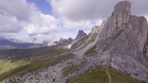Aerial Flight Above Mountain Top in Sunny Day