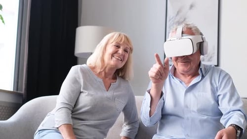 Senior Couple Enjoys Virtual Reality Experience Together