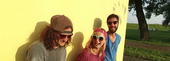 Close up of happy skateboarders having fun