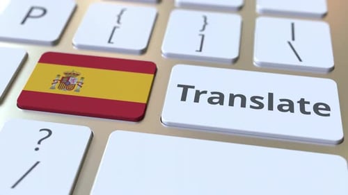 Spanish Flag Button and Translate Key on Computer Keyboard