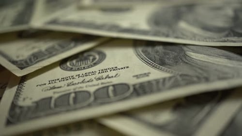 Pile of One Hundred Dollar Bills