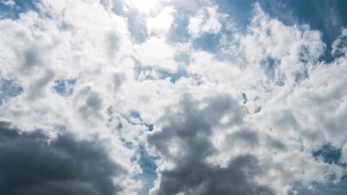 Blue sky white clouds with Puffy fluffy white clouds. Cumulus cloud cloudscape timelapse