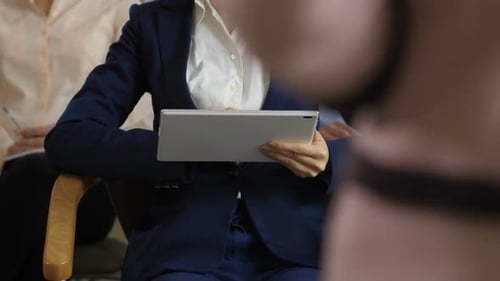 Business People Using Technology in Corporate Setting