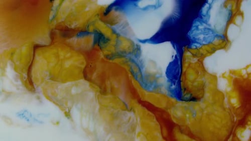 Abstract Colors Mixing Liquid Inks Close Up