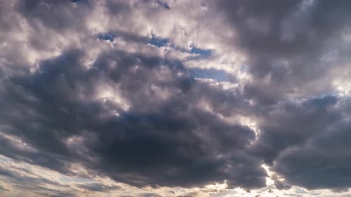 Clouds in the Blue Sky Slowly Move and Change Shape Timelapse