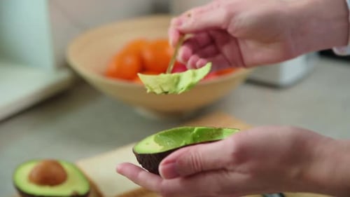 Scooping Avocado to Make a Healthy Sandwich