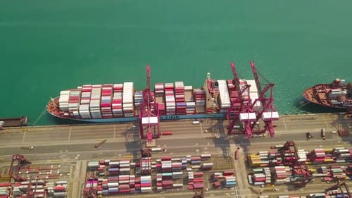 Aerial top view of container cargo ship in the export and import business and logistics
