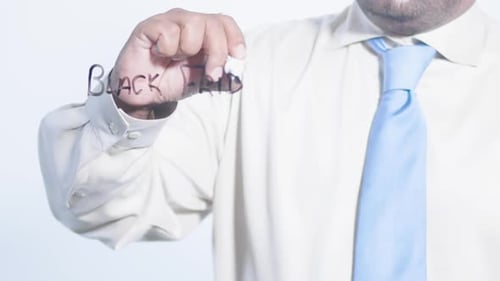 Adult Writes Black Friday on Clear Surface