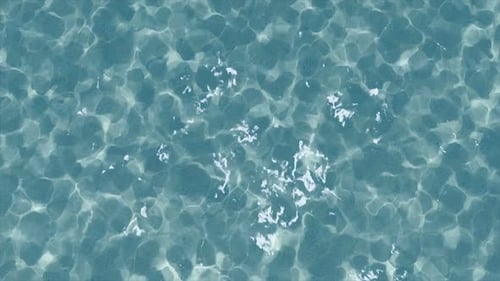 Seamless Loop of Clear Blue Ocean Water Surface