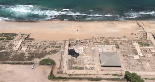 Aerial footage of the ancient remains of the coastal city of Caesarea, built under Herod the Great d