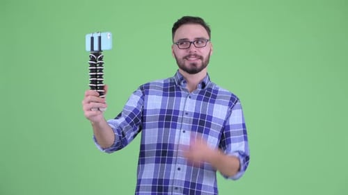 Young Adult Making Video on Phone with Tripod