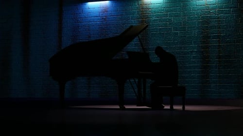 Pianist Silhouette Playing Grand Piano on Stage with Dynamic Lighting