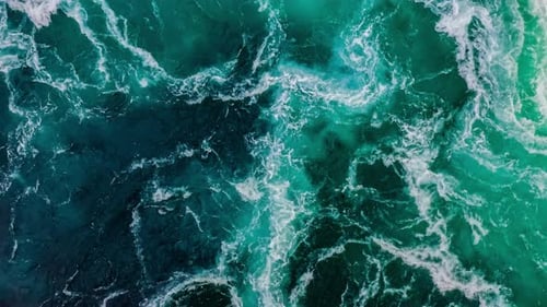 Waves of Water of the River and the Sea Meet Each Other During High Tide and Low Tide