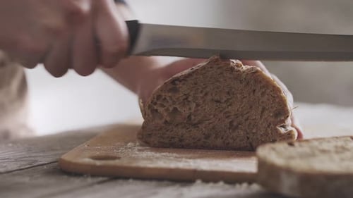 Multigrain Bread Sliced on Wooden Cutting Board