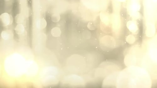 Abstract Golden Bokeh Lights Background with Sparkling Particles