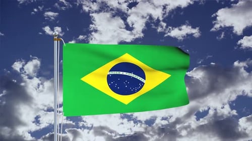 Brazilian Flag Waving Against Blue Sky with Clouds