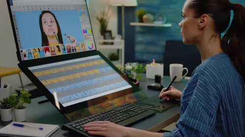 Retouch Editor Working on Editing Pictures at Media Studio