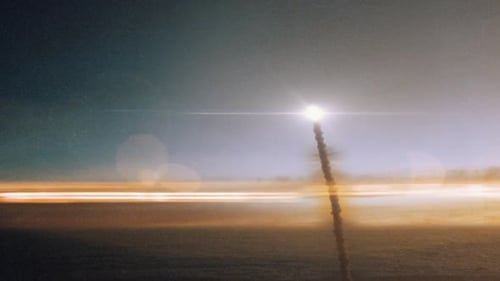 Cinematic Light Rise from Horizon with Lens Flare