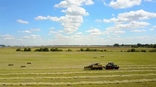 Tractor Collecting Straw