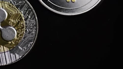 Cryptocurrency Coins with Circuit Board Detail on Black