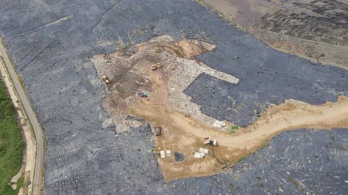 Aerial Top View Video of a Solid Waste Landfill. City Waste Treatment Location. Environmental