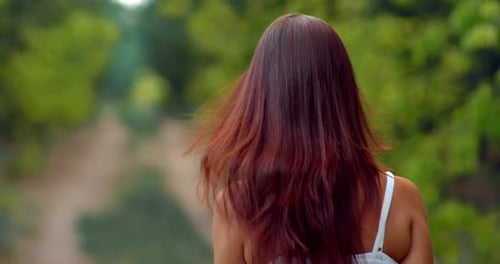 Portrait a Woman with Long Hair Walking Through the Forest a Walk in Nature