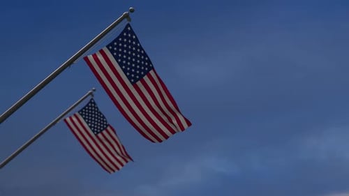 United States Of America Flags In The Blue Sky - 2K