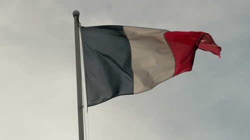 French Flag Waving Proudly in the Breeze